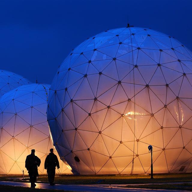 Radar domes lit at dusk